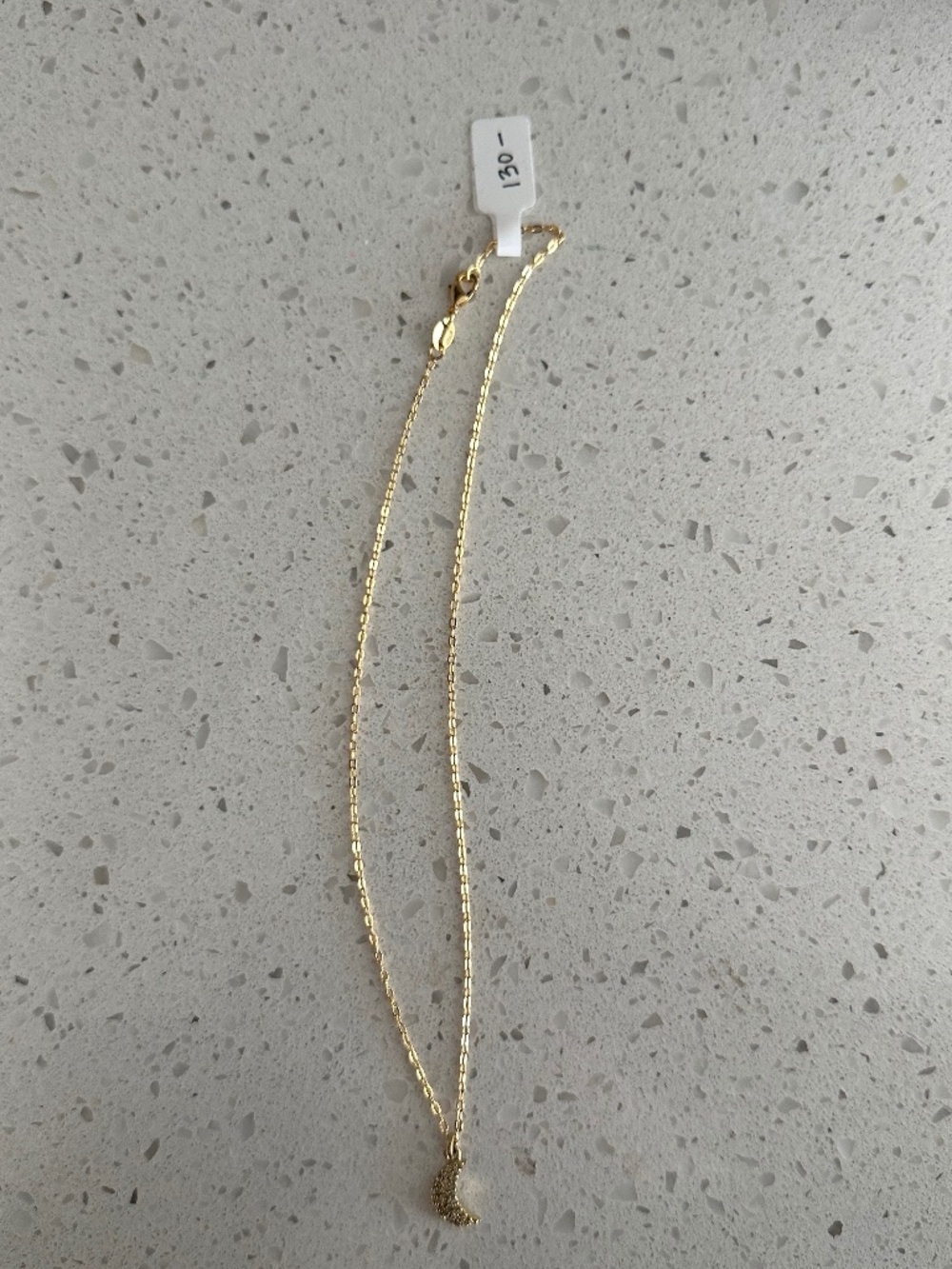 Gold and diamond moon necklace